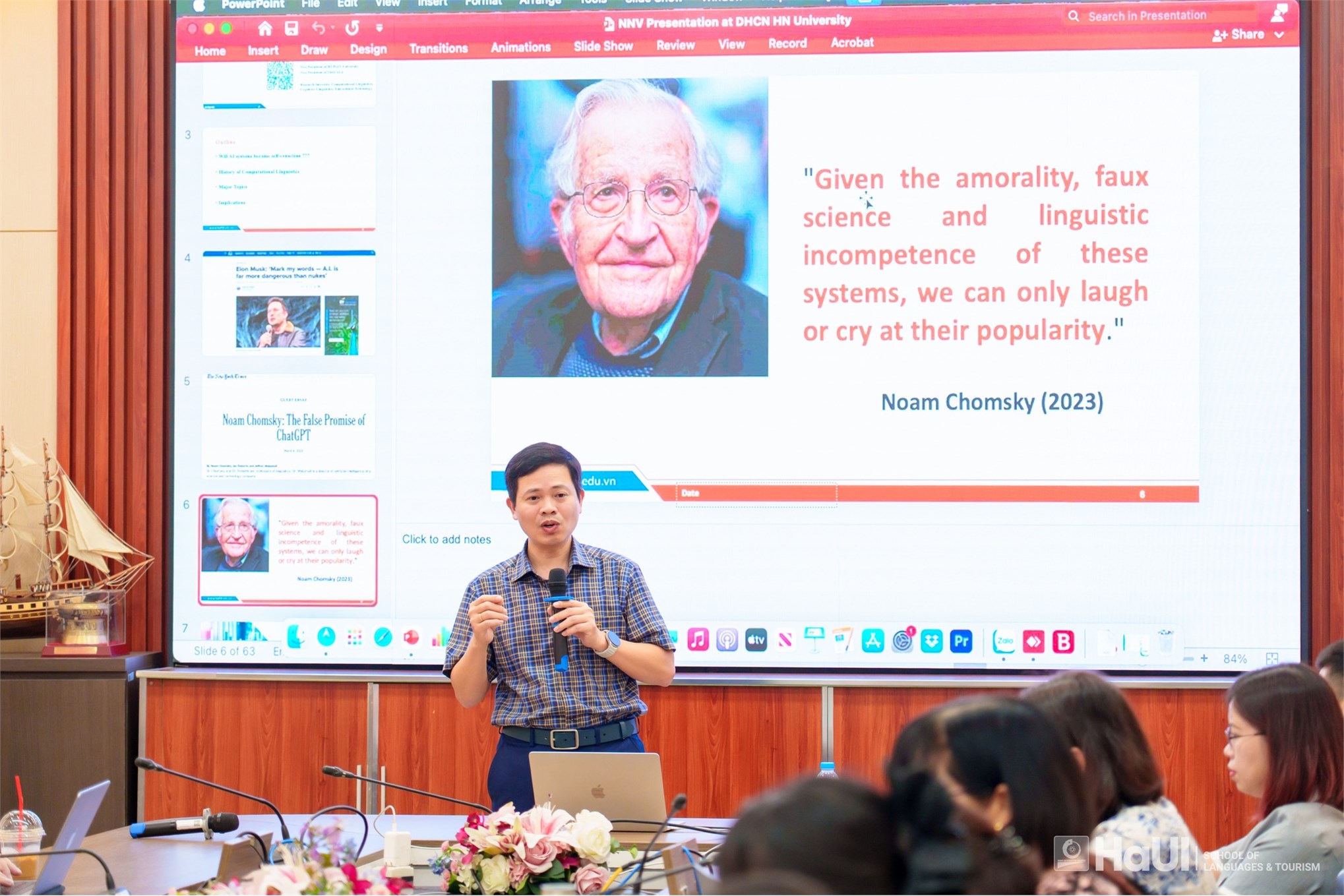 Có thể là hình ảnh về ‎8 người, mọi người đang học, kính mắt, cái bục và ‎văn bản cho biết '‎Home Insert Draw Design Transitions Animations 0 NINV Presentation Slide Show Review View DHCN Univerelty Record Acrobat --- a Search Presentation + Share Has و4- 